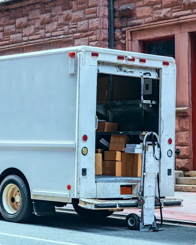 white-color-truck-delivering-packages-manhattan-d